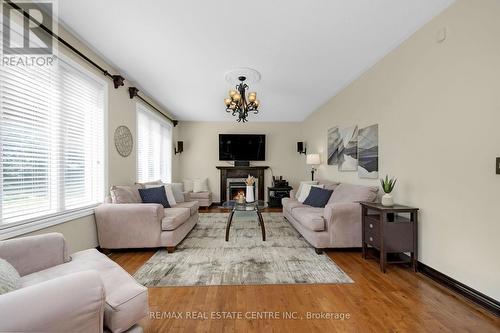 15 Upper Canada Drive, Erin (Hillsburgh), ON - Indoor Photo Showing Living Room With Fireplace