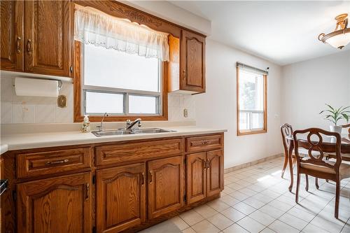 159 West 26Th Street, Hamilton, ON - Indoor Photo Showing Kitchen With Double Sink