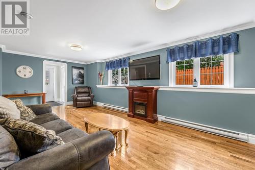 14 Tobins Road, Conception Bay South, NL - Indoor Photo Showing Living Room With Fireplace