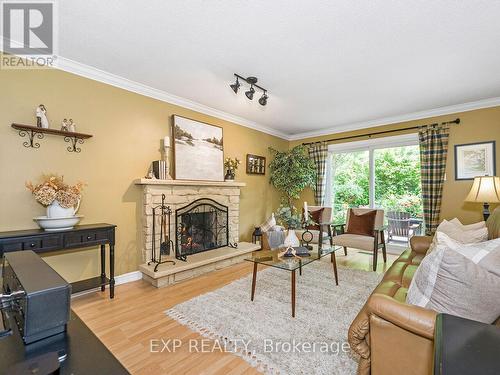 2048 Parklane Crescent, Burlington (Rose), ON - Indoor Photo Showing Living Room With Fireplace