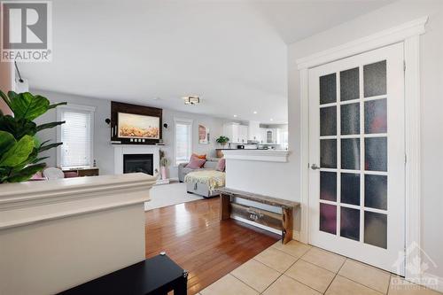 This view from the foyer shows one of TWO closets!  One to serve guests and the other for the family - 116 Mclachlin Street S, Arnprior, ON - Indoor With Fireplace