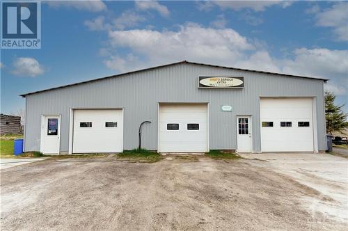 Amazing detached garage with 3 bays.  Business NOT being sold with house.  Heat (propane) & hydro - 1560 South Mcnaughton Road, Admaston, ON - Outdoor