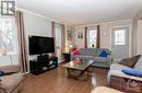 Spacious living room for entertaining the whole family! - 1560 South Mcnaughton Road, Admaston, ON  - Indoor Photo Showing Living Room 