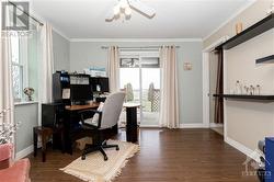 The formal dining room is now being used as a home office.  Lots of light here too! - 