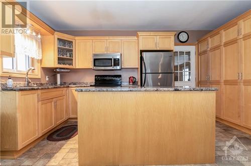 You could easily turn the island into a breakfast bar but you don't need to; there is so much space! - 1560 South Mcnaughton Road, Admaston, ON - Indoor Photo Showing Kitchen