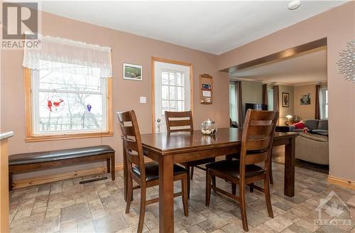 Large eating area in the country kitchen with access to the side deck; great for barbecues! - 1560 South Mcnaughton Road, Admaston, ON - Indoor Photo Showing Dining Room