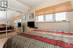 Another view of primary bedroom showing the wall of closet! - 