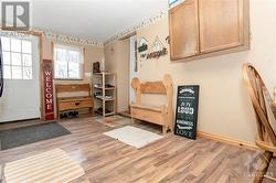 Imagine having a mud room this big!  Makes for a great indoor play area and more! - 