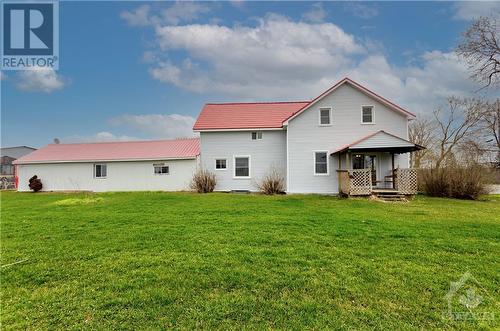 Side view showing porch off dining room and the length of the attached garage/storage area! - 1560 South Mcnaughton Road, Admaston, ON - Outdoor