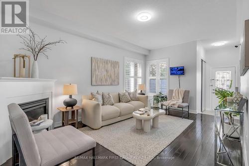 35 Crossbrooks Street, Markham (Cornell), ON - Indoor Photo Showing Living Room With Fireplace