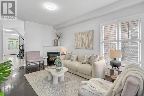 35 Crossbrooks Street, Markham (Cornell), ON - Indoor Photo Showing Living Room With Fireplace