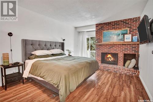 206 Frobisher Crescent, Saskatoon, SK - Indoor Photo Showing Bedroom With Fireplace