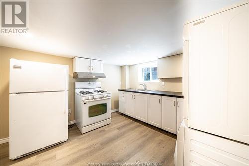 1060 Mckay, Windsor, ON - Indoor Photo Showing Kitchen With Double Sink