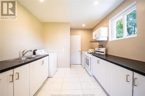 1060 Mckay, Windsor, ON - Indoor Photo Showing Kitchen With Double Sink