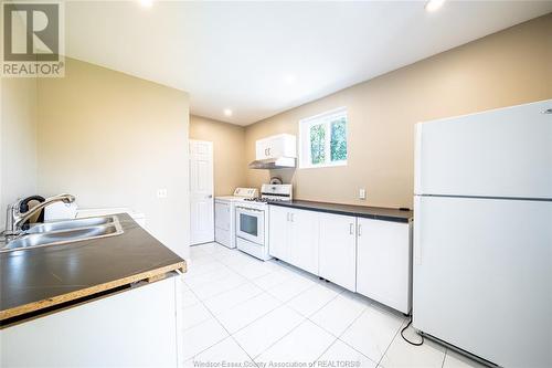 1060 Mckay, Windsor, ON - Indoor Photo Showing Kitchen With Double Sink