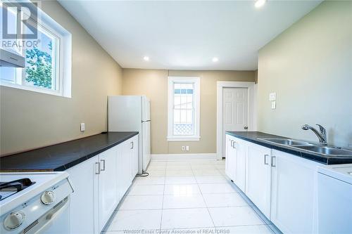 1060 Mckay, Windsor, ON - Indoor Photo Showing Kitchen With Double Sink