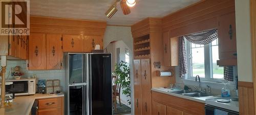 11 Teachers Lane, Anchor Point, NL - Indoor Photo Showing Kitchen With Double Sink