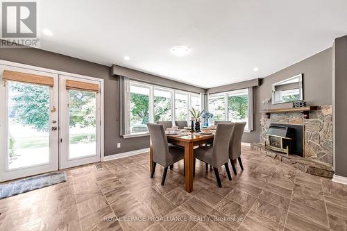 223 Garrard Road, Whitby (Blue Grass Meadows), ON - Indoor Photo Showing Dining Room With Fireplace