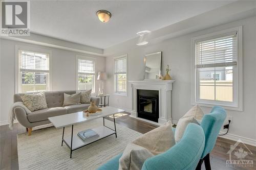 210 Clintonia Street, Ottawa, ON - Indoor Photo Showing Living Room With Fireplace