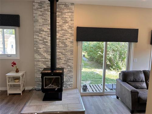 316 Hossack Avenue, Killarney, MB - Indoor Photo Showing Living Room With Fireplace