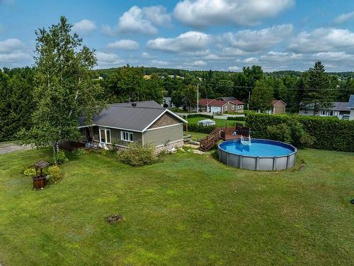 Aerial photo - 131 Rue Des Mésanges, Val-Des-Sources, QC - Outdoor With Above Ground Pool