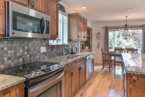 7372 Fintry Delta Road, Kelowna, BC - Indoor Photo Showing Kitchen With Double Sink With Upgraded Kitchen