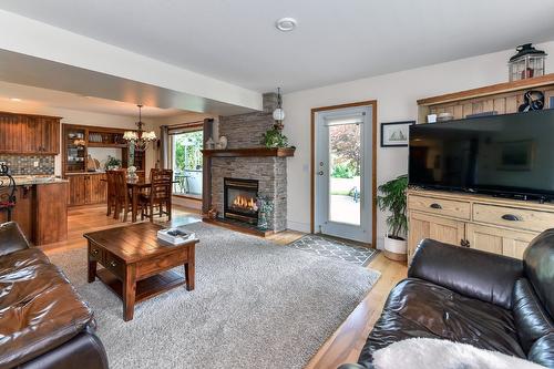 7372 Fintry Delta Road, Kelowna, BC - Indoor Photo Showing Living Room With Fireplace