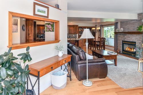 7372 Fintry Delta Road, Kelowna, BC - Indoor Photo Showing Living Room With Fireplace