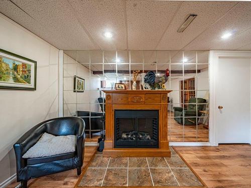 Salle familiale - 34 Rue Trottier, Victoriaville, QC - Indoor With Fireplace