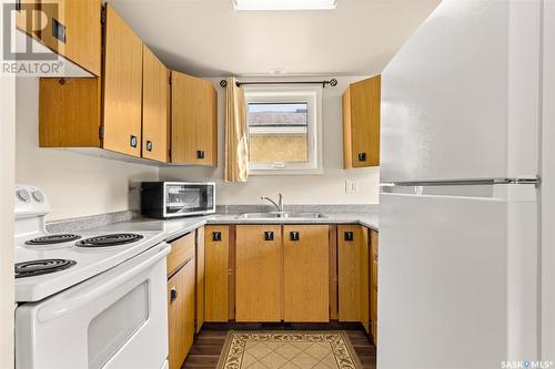 710 Rae Street, Regina, SK - Indoor Photo Showing Kitchen With Double Sink