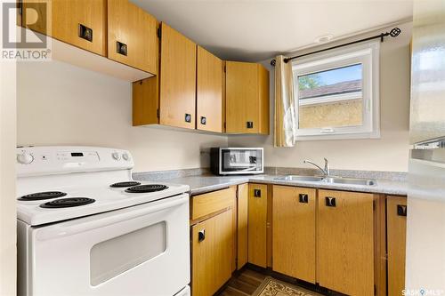 710 Rae Street, Regina, SK - Indoor Photo Showing Kitchen With Double Sink