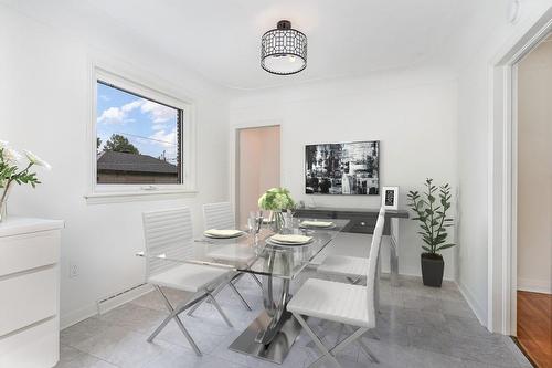 Virtually staged - 40 Robroy Avenue, Hamilton, ON - Indoor Photo Showing Dining Room