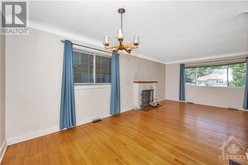 213 Ancaster Avenue, Ottawa, ON - Indoor Photo Showing Living Room With Fireplace