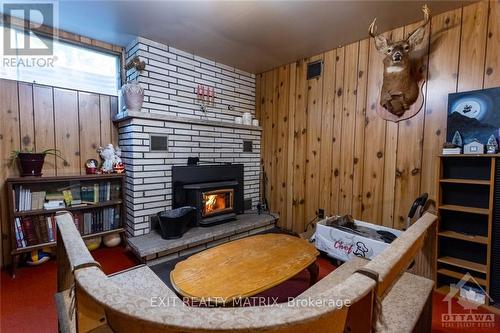 1171 Wade Road, Russell, ON - Indoor With Fireplace