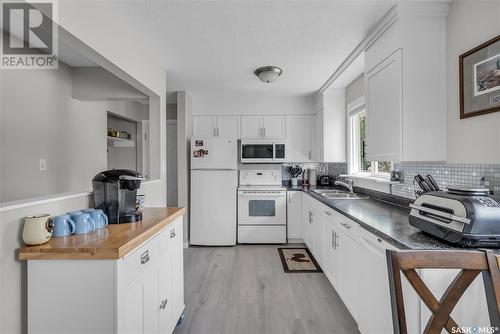 11303 8Th Avenue, North Battleford, SK - Indoor Photo Showing Kitchen With Double Sink