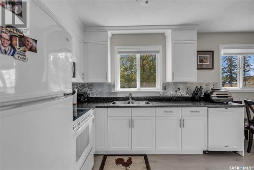 11303 8Th Avenue, North Battleford, SK - Indoor Photo Showing Kitchen With Double Sink