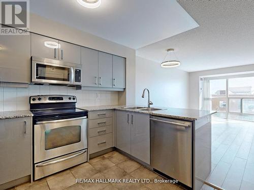 503 - 185 Oneida Crescent E, Richmond Hill (Langstaff), ON - Indoor Photo Showing Kitchen With Double Sink