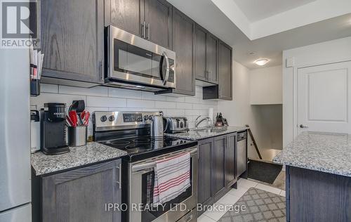 98 - 30 Fieldway Road, Toronto (Islington-City Centre West), ON - Indoor Photo Showing Kitchen With Stainless Steel Kitchen With Upgraded Kitchen