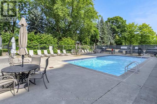 1105 - 1201 North Shore Boulevard E, Burlington (Brant), ON - Outdoor With In Ground Pool