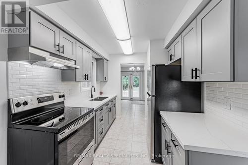 30 Winterfold Drive, Brampton (Madoc), ON - Indoor Photo Showing Kitchen With Double Sink