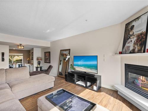3383 Mariposa Dr, Nanaimo, BC - Indoor Photo Showing Living Room With Fireplace