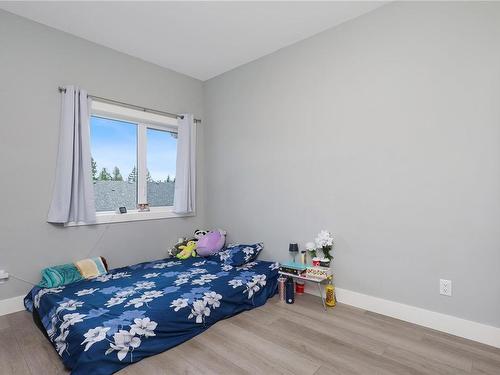 3-623 Crown Isle Blvd, Courtenay, BC - Indoor Photo Showing Bedroom