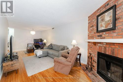 2462 Grindstone Court, Mississauga, ON - Indoor Photo Showing Living Room With Fireplace