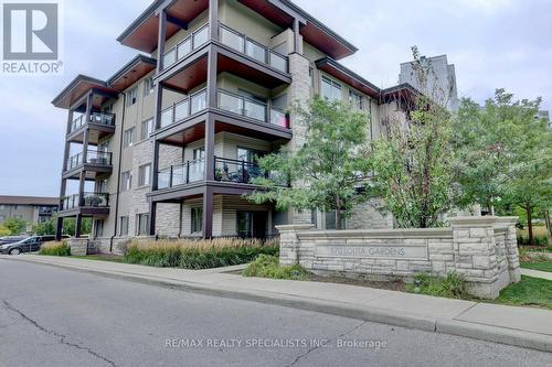 307 - 570 Lolita Gardens, Mississauga, ON - Outdoor With Balcony With Facade