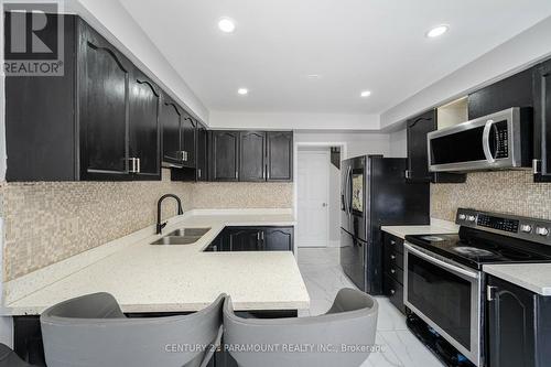 67 Millstone Drive, Brampton, ON - Indoor Photo Showing Kitchen With Double Sink
