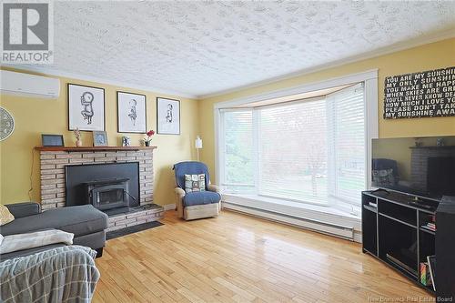 33 Fletcher Court, Fredericton, NB - Indoor Photo Showing Living Room With Fireplace