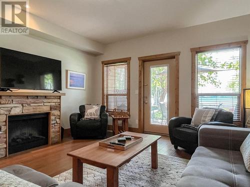 5401 Lakeshore Drive Unit# 105, Osoyoos, BC - Indoor Photo Showing Living Room With Fireplace