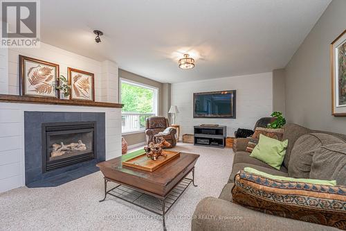 86 Osprey Ridge Road, Barrie, ON - Indoor Photo Showing Living Room With Fireplace