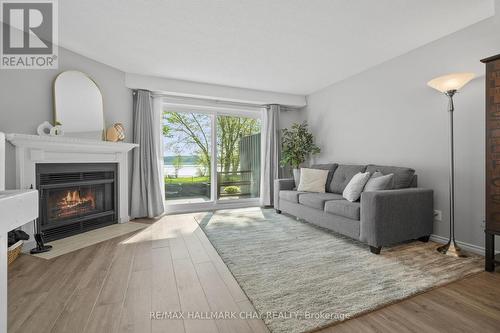 4 - 1 Olive Crescent, Orillia, ON - Indoor Photo Showing Living Room With Fireplace