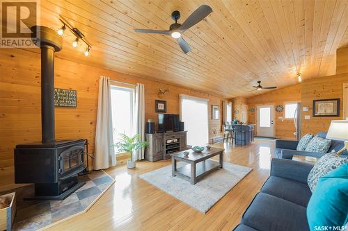 113 Merle Crescent, Macpheat Park, SK - Indoor Photo Showing Living Room With Fireplace